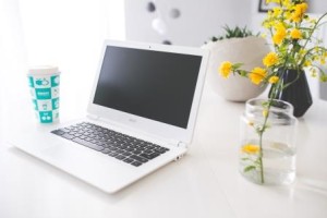 where writers write coffee-desk-laptop-notebook