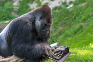Ape using a typewriter