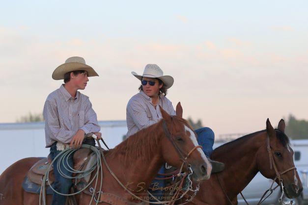 young cowboys on horseback copyright KS Brooks