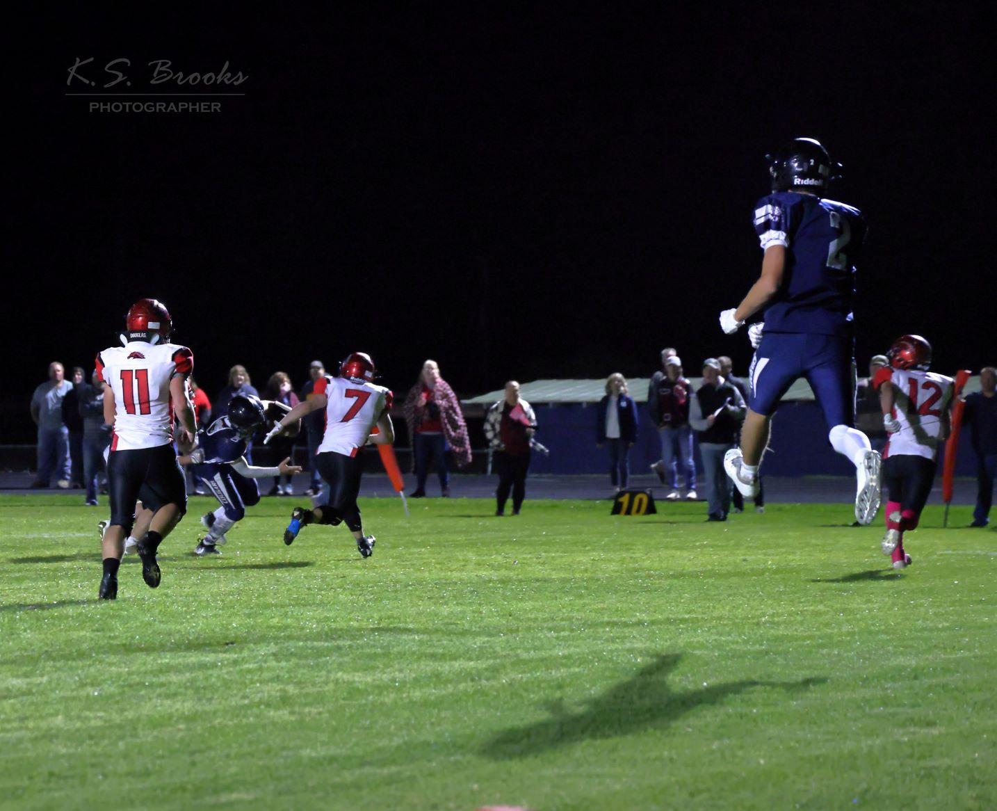 football levitating feet off the ground during game copyright KS Brooks